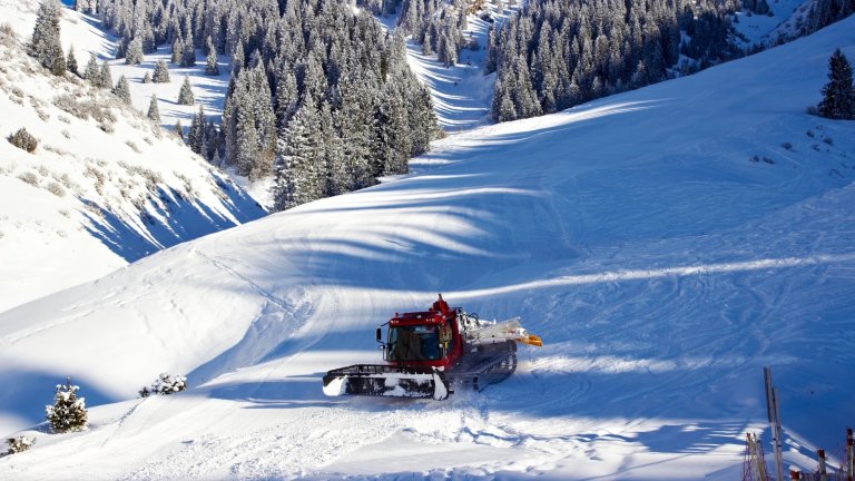 Snowcat car in a snow ski resort.