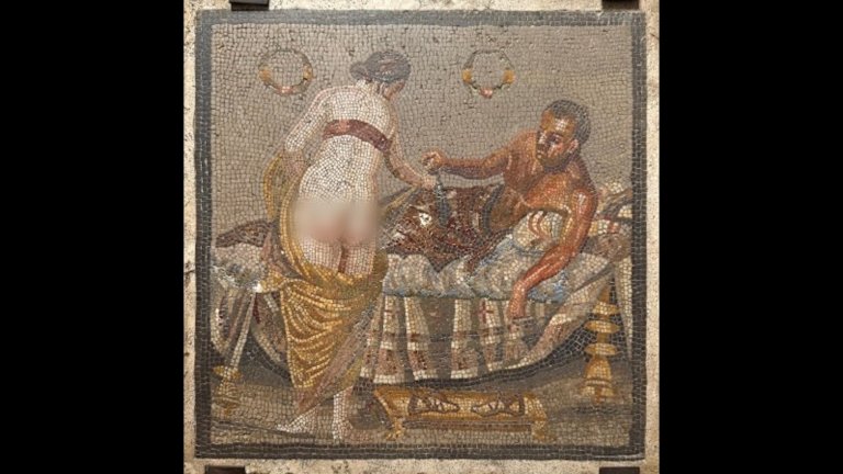 Roman tile art depicting two lovers with woman's backside blurred